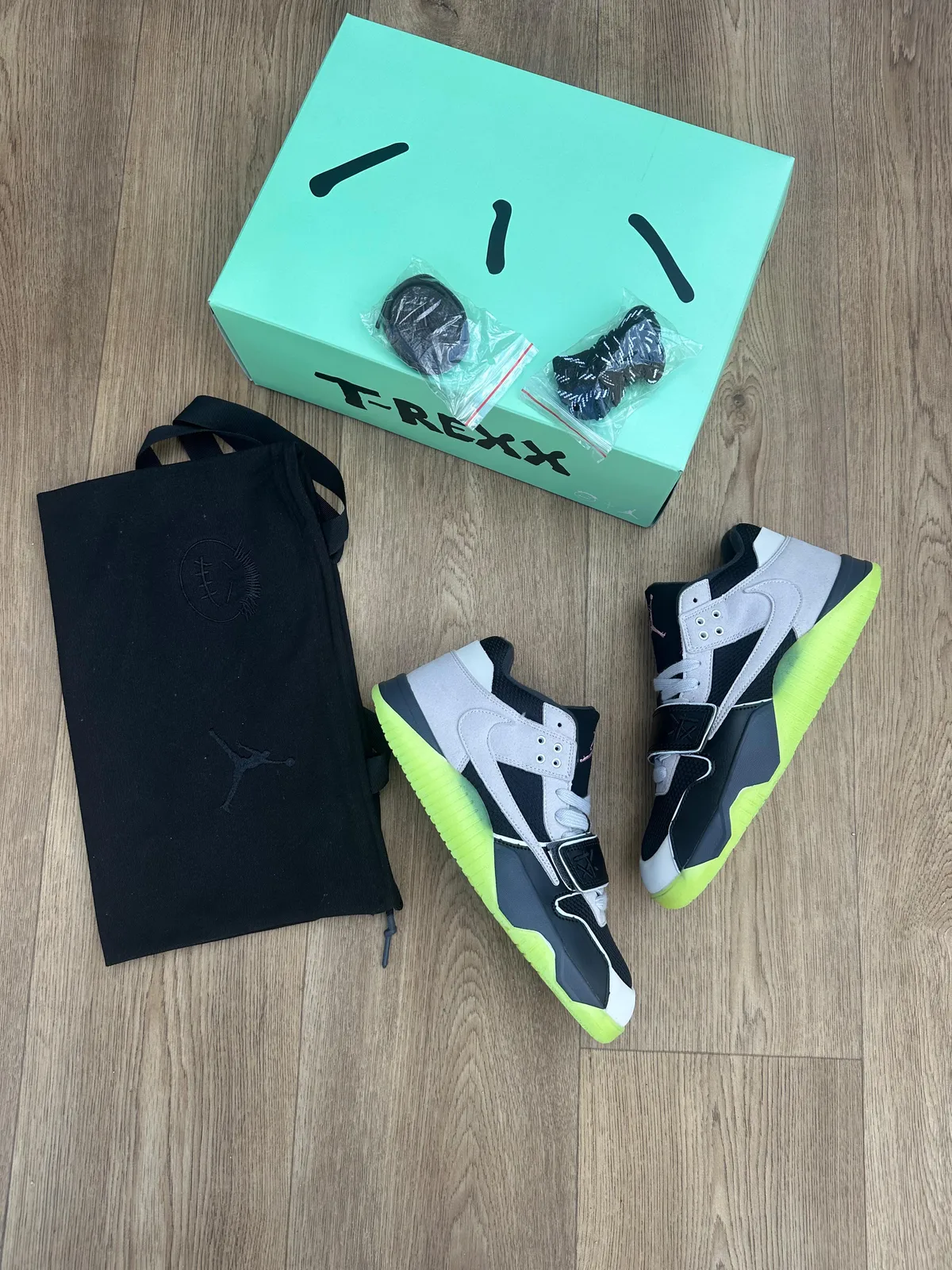 Jumpman Jack with neon yellow outsole and mid-foot strap
